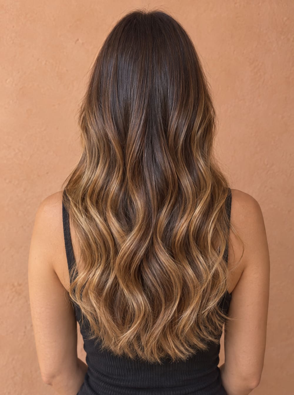 After: honey balayage with glossy waves