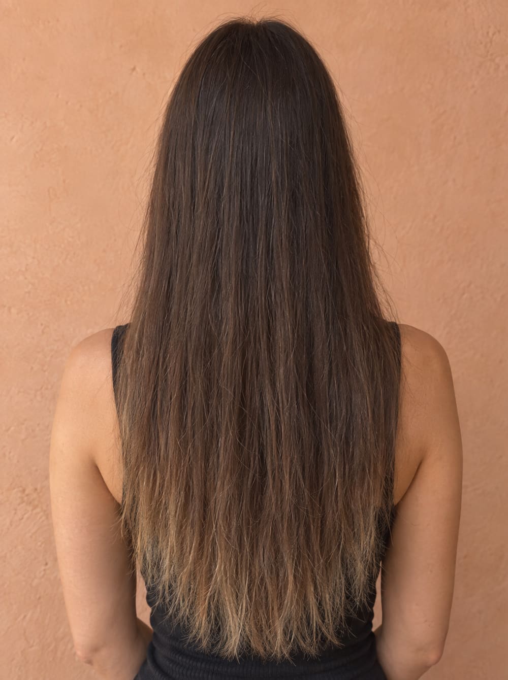 Before: long brown hair, flat with dry ends